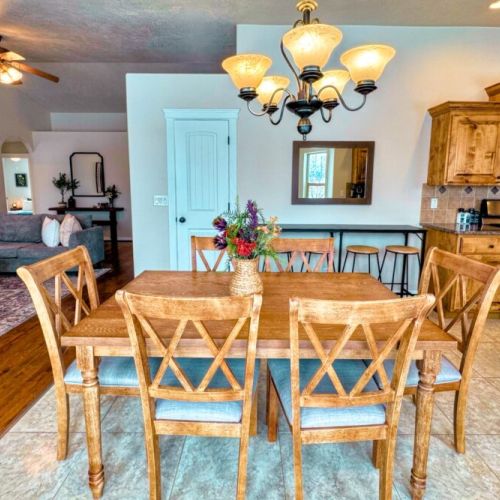 Gather around the dining table for conversation, food, and fun.