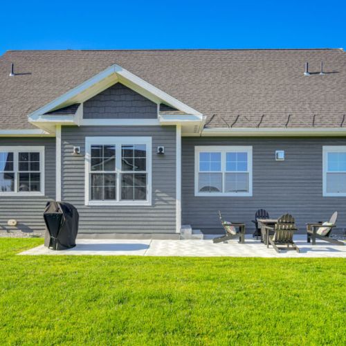 Head out back to enjoy comfortable outdoor seating or to make a meal on the propane grill.