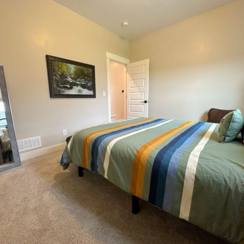 Bedroom #2, located on the main floor, has a queen bed and a large closet.