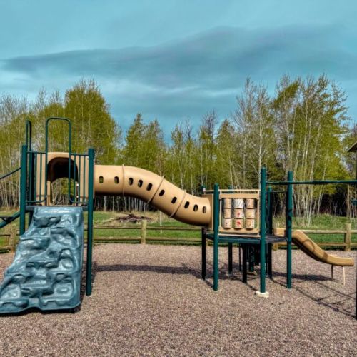 The neighborhood around the home has a playground and beautiful walking paths.