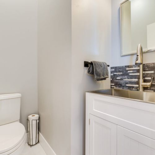 A half-bath is located conveniently off of the kitchen.