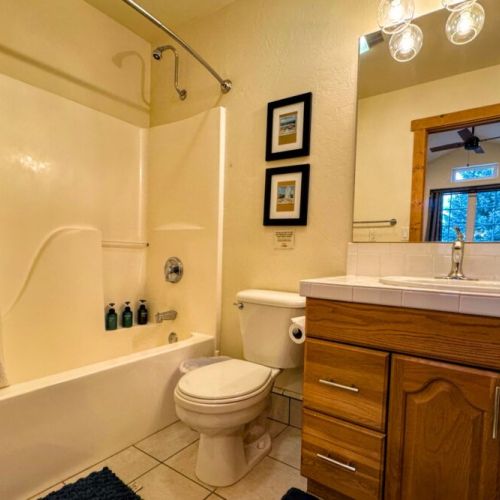 The master en suite has a convenient vanity and a tub/shower combo.