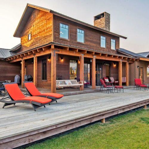 The expansive back deck is the perfect hangout spot to enjoy a little fresh air and unmatched views of the Tetons.