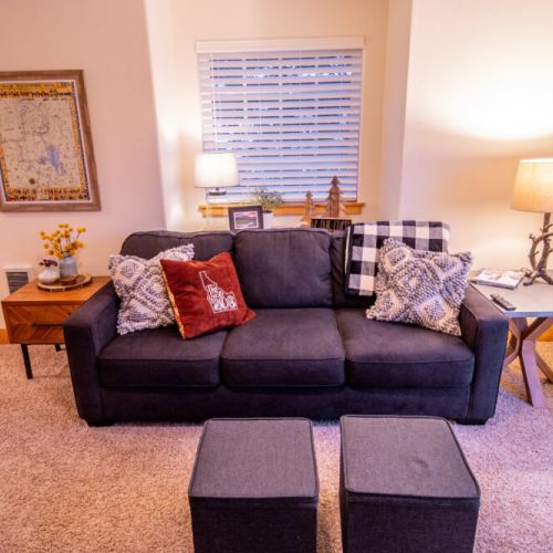 Kick back and relax in the living room, taking advantage of the cozy seating and a large TV.
