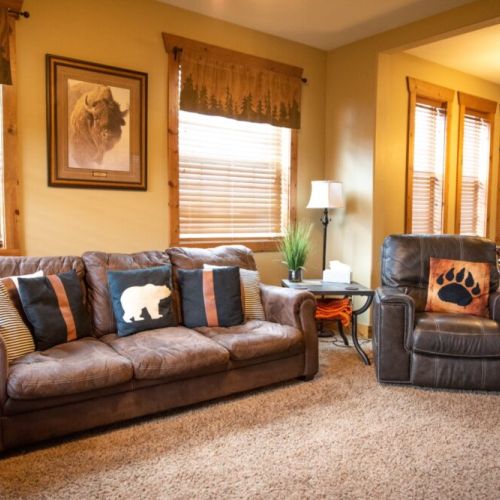 Whether you are sitting down to relax in the living room or having a snack at the dining room table, you can always be a part of the fun in this condo.