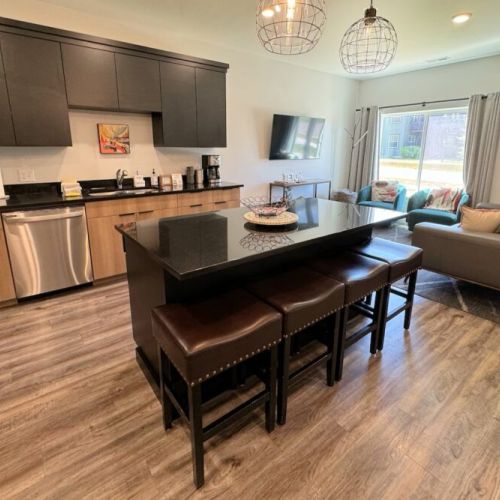 Whether you are relaxing in the living room or hanging in the kitchen, the open layout means you are always a part of the fun in this home.