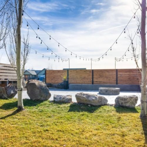 Out in the backyard, make use of the propane firepit or have a family meal.