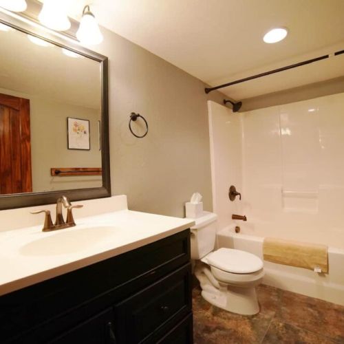Bedrooms #4 and #5 share a bathroom with a large tub/shower.
