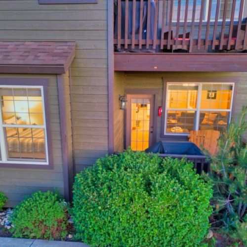 On the porch off the living room, make use of a propane grill or relax on a two-seat wood rocker.