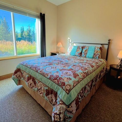Bedroom #3, which looks out into the backyard, has a queen bed and plenty of closet space.