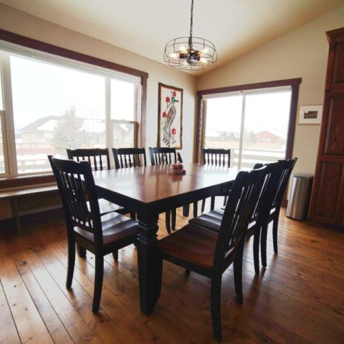 The dining room table can fold out to accommodate your entire party!