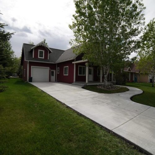 Corner lot with a single garage space and driveway so everyone has a place to park.