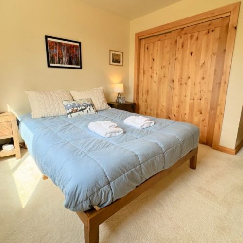 Bedroom #3 also features a queen bed, in addition to a west-facing window with a view of the serene canal behind the home.