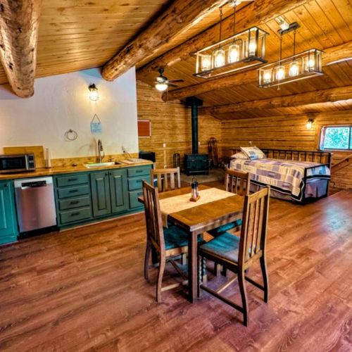 The loft apartment has a queen bed, as well as a twin day bed with a trundle.