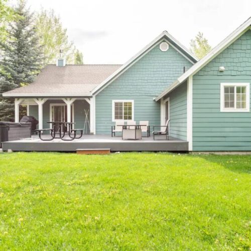 Head to the back porch to enjoy the big yard, outdoor seating, a propane BBQ, and the hot tub.