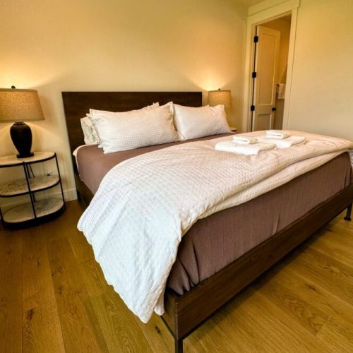 Bedroom #2 (ground floor) has a king bed, views of the front of the home, and its own en suite bathroom.