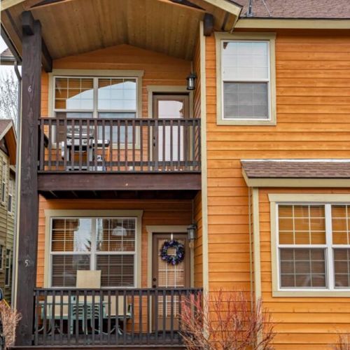 The second-floor balcony off the living room comes with a gas grill.