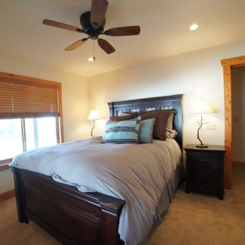 Bedroom #3, located in the basement, has a queen bed and great closet space.