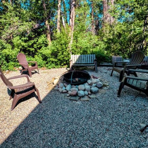 The outdoor fire pit is the perfect place to unwind at the end of a day of adventure.