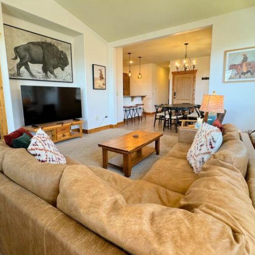 Kickback at the end of a day of skiing, hiking, or biking by relaxing in the cozy living room.