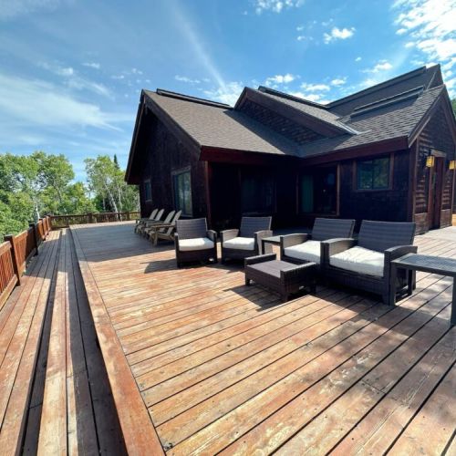 Enjoy the peace and quiet outside on the expansive wrap-around porch.