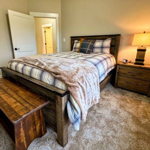 Bedroom #2 has a queen bed and a lovely view of the front yard.