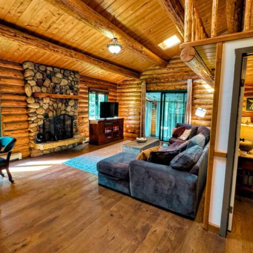 The second living area enjoys a large sectional and a smart TV.