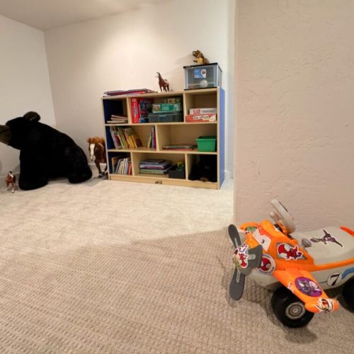 The kid's room comes equipped with plenty of toys and games.