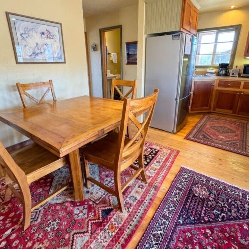 Gather around the dining table for conversation, food, and fun.