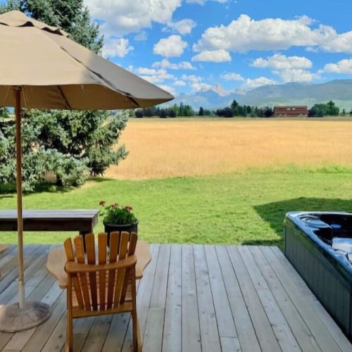 Enjoy a view of the mountains while you take a luxurious soak in the hot tub!