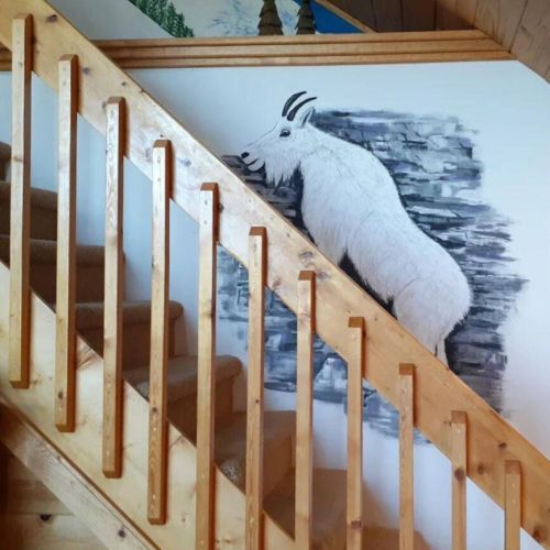 The home is full of fun, hand-painted murals!