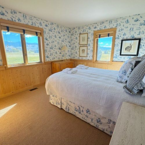 Bedroom #3 has a queen bed, lots of storage, and its own beautiful view of the mountains.