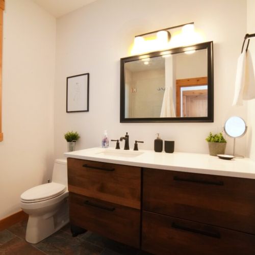 The en suite bath has a lovely vanity and walk-in shower.