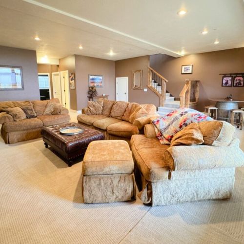 This is the perfect space to enjoy a family movie night or a relaxing day at home.