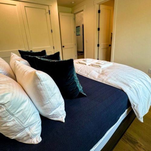 Bedroom #3 (ground floor) has a queen bed and an en suite bathroom.