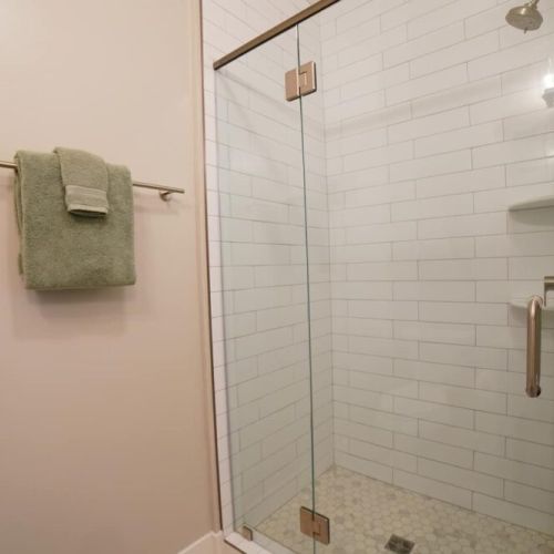The master en suite bath has a spacious double vanity and a walk-in shower.