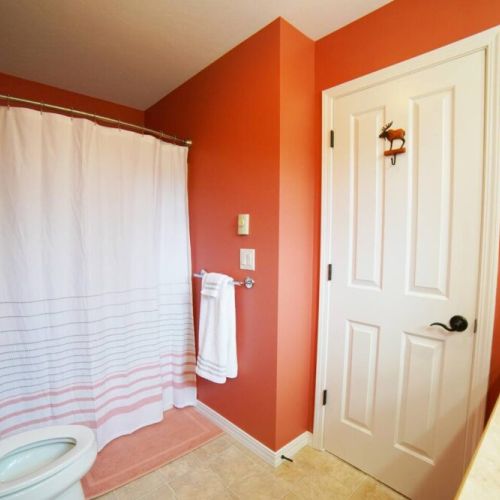 The master en suite has a double vanity and a large tub/shower combo.