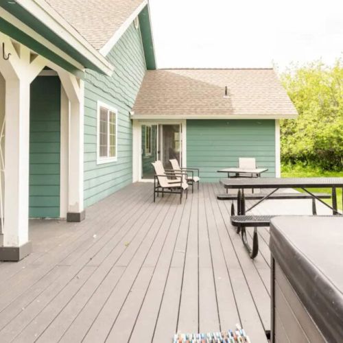 When you aren't soaking in the hot tub, you can relax in the outdoor chairs or enjoy an al fresco meal.