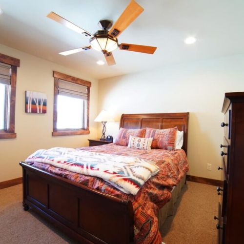 Bedroom #3 has a queen bed, as well as a large closet and drawers.
