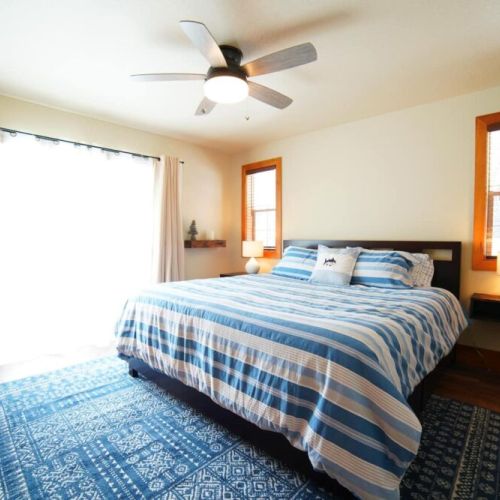 The master bedroom has a king bed and an en suite bath, as well as a large closet.