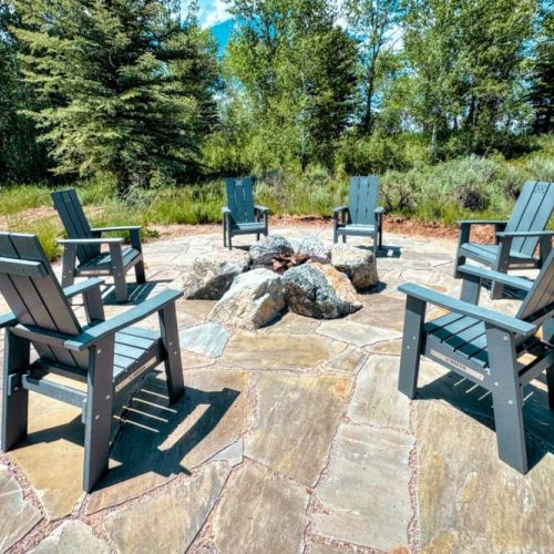 The outdoor fire pit offers a cozy, relaxing option for unwinding.