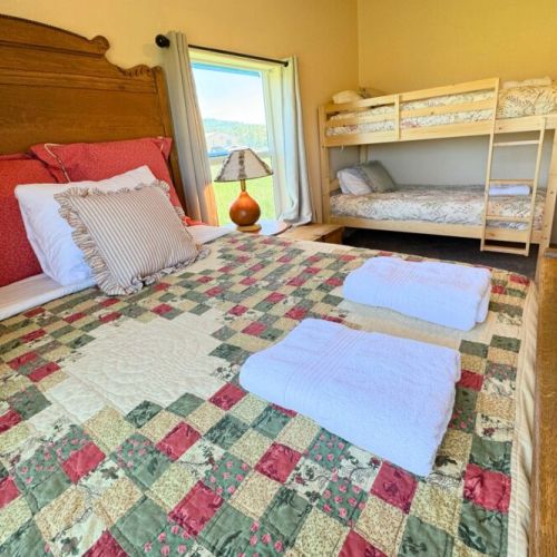 Bedroom #3 has a full bed and a twin-over-twin bunk — perfect for kids!