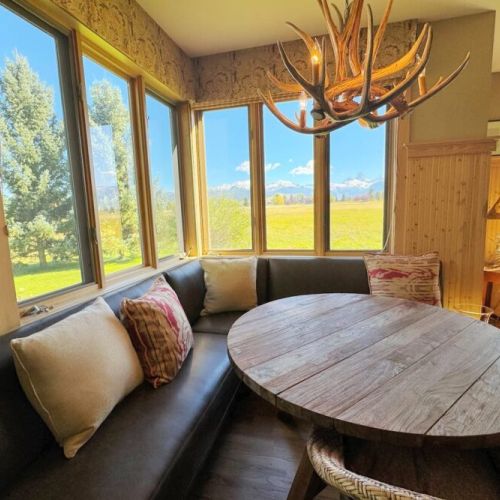 Gather around the dining table for food, conversation, or fun.