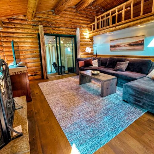 The second living area enjoys a large sectional and a smart TV.