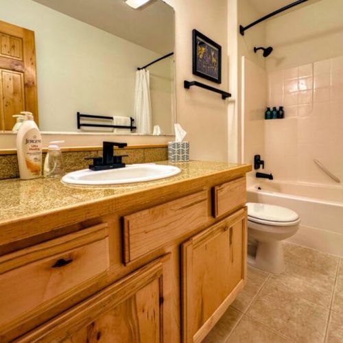 Bedrooms #2 and #3 share a full bathroom, which features a large/tub shower combo.