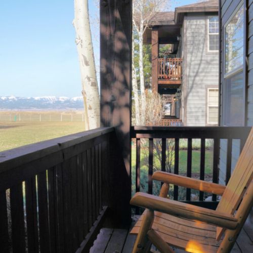 On the porch off of Bedrooms #2 and #3, take in breathtaking views of the Big Hole Mountains in the west.