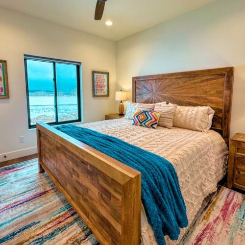 Bedroom #2 enjoys a king bed and a spacious closet, as well as access to a Jack-and-Jill-style bathroom (shared with Bedroom #3).