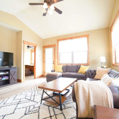 Kickback at the end of a day of skiing, hiking, or biking by relaxing in the cozy living room.