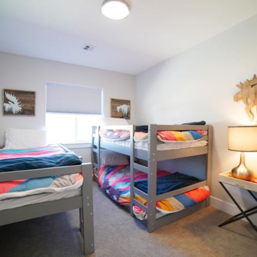 Bedroom #3 features three beds, all twins — perfect for kids!