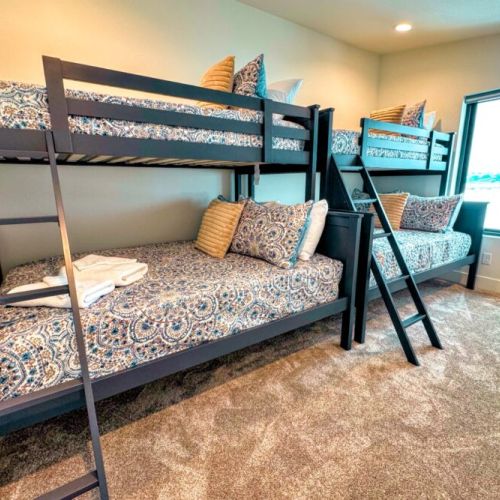 Bedroom #4 has two twin-over-full bunk beds — perfect for kids!